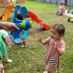 Alba having fun with bubbles!