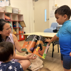 Kavi enjoying our mystery reader session with Berny and Ivan (Nate’s parents)!