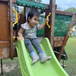 Cara having fun on the slide!