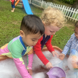 Mateo and Arthur having much fun with foam!