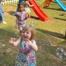 Edwina having fun with bubbles.