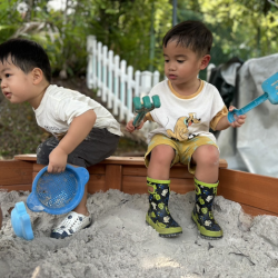 Mateo and Wesley having much fun in the sand pit!